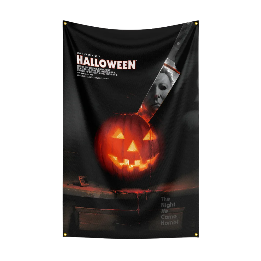 A black flag featuring a carved jack-o'-lantern face and text for Halloween decor.