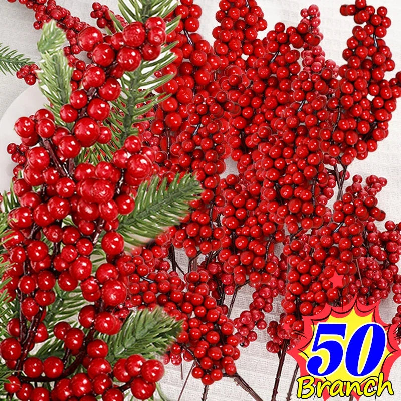 A close-up of artificial red holly berry stems used for Christmas decor.