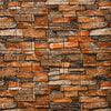 A textured stone veneer wall made of rectangular tiles in shades of brown, tan, and gray.