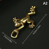 Vintage brass frog statue desktop ornament with a loop for hanging