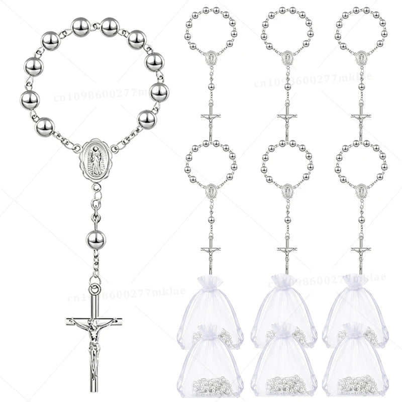 A collection of mini baptism rosary favors featuring various cross styles and designs.