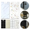 A collection of marble wall decals featuring white, gold, and green veining patterns for kitchen and bathroom decor.