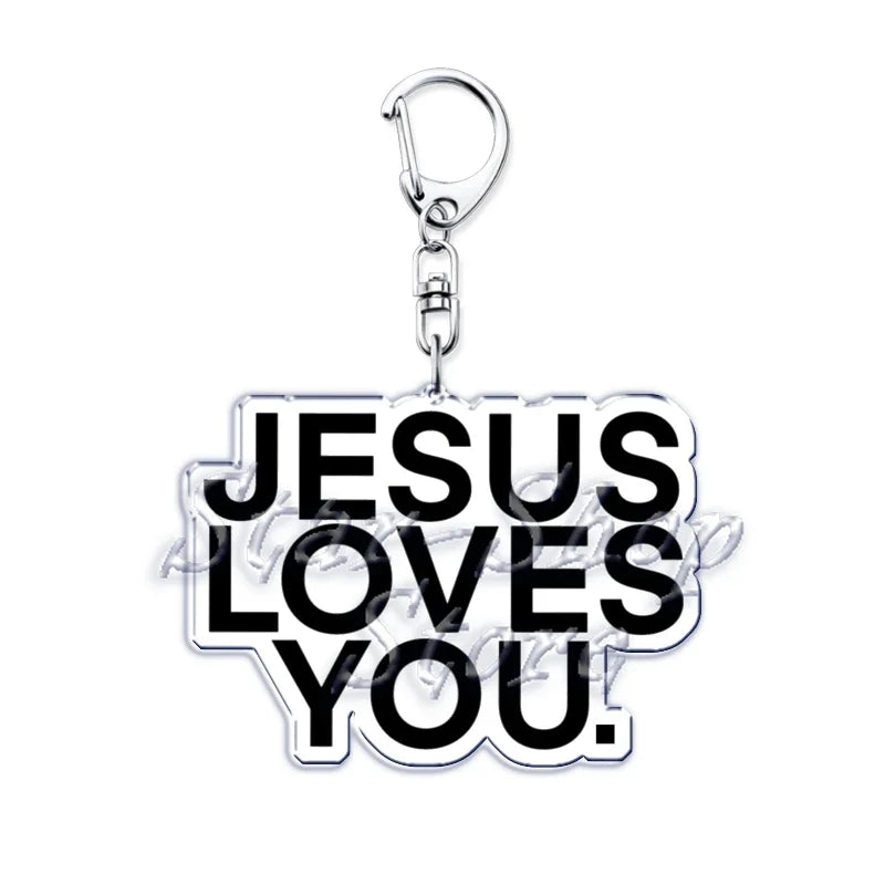 Silberner Acryl-Anhänger mit der Gravur „Jesus liebt dich“.