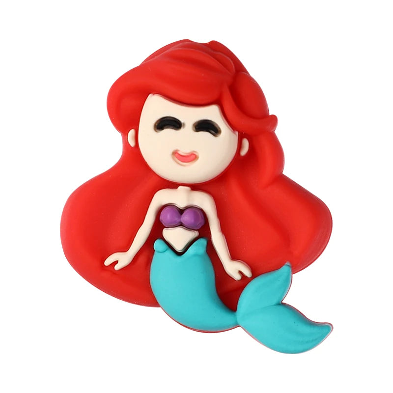 A red silicone plant bead shaped like a mermaid with purple and blue accents.