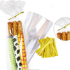 Clear cellophane treat bags filled with yellow pasta and tied with wire