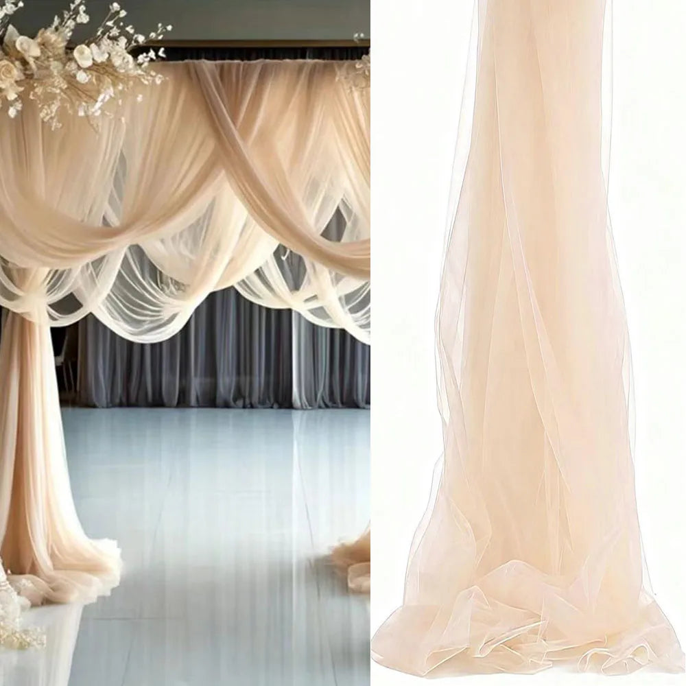 Light beige sheer tulle draping fabric used for a wedding arch backdrop