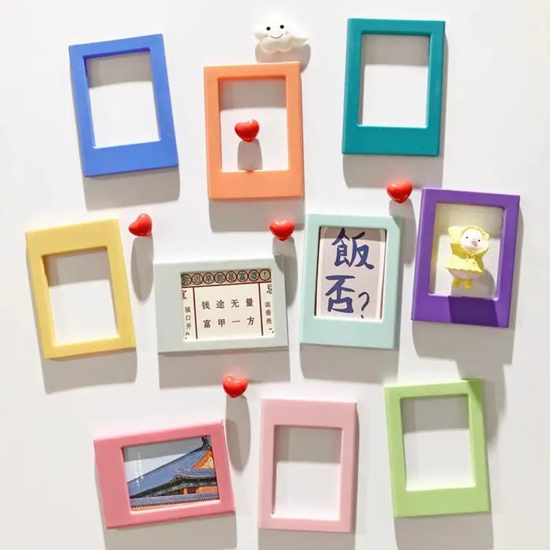 A set of five decorative photo frames in various colors, including blue, orange, green, purple, and pink, with small heart ma