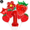 A set of red strawberry and number balloons for a party kit