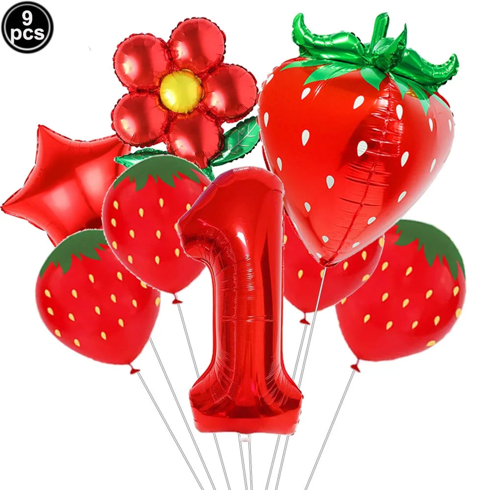 A set of red strawberry and number balloons for a party kit
