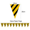 A set of ten black and yellow striped paper flags for a construction vehicle themed party.