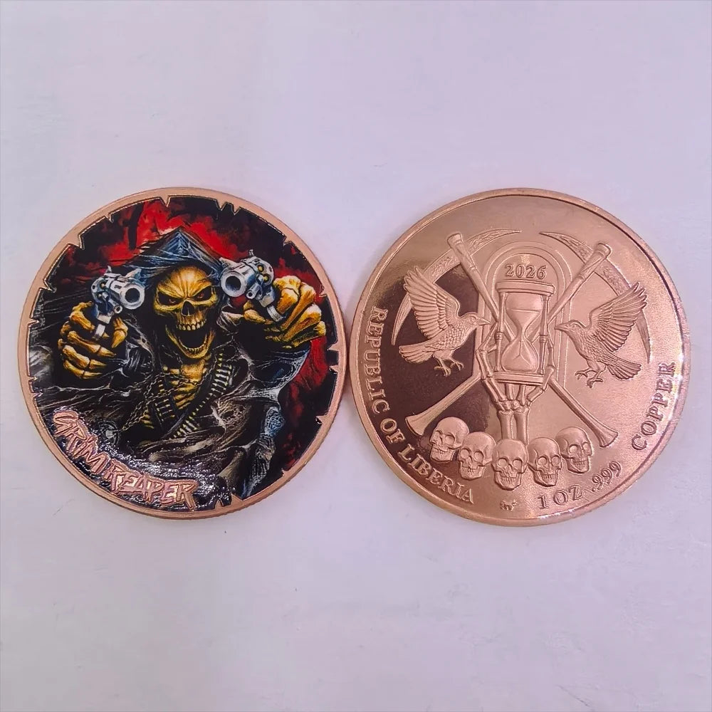 A gold-colored challenge coin featuring a grim reaper design with a skull and pirate theme.