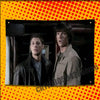 A promotional banner featuring two actors in a dark setting, set against a yellow background with red polka dots.