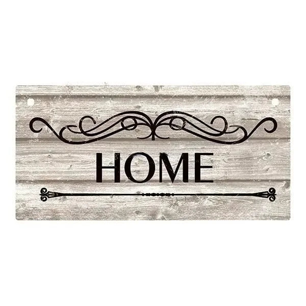 Rustic wooden hanging sign with the word HOME carved into the wood.