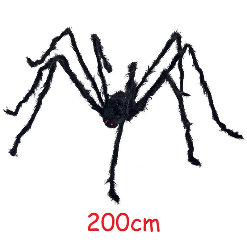 A black plush spider with long legs, used as a Halloween decoration.