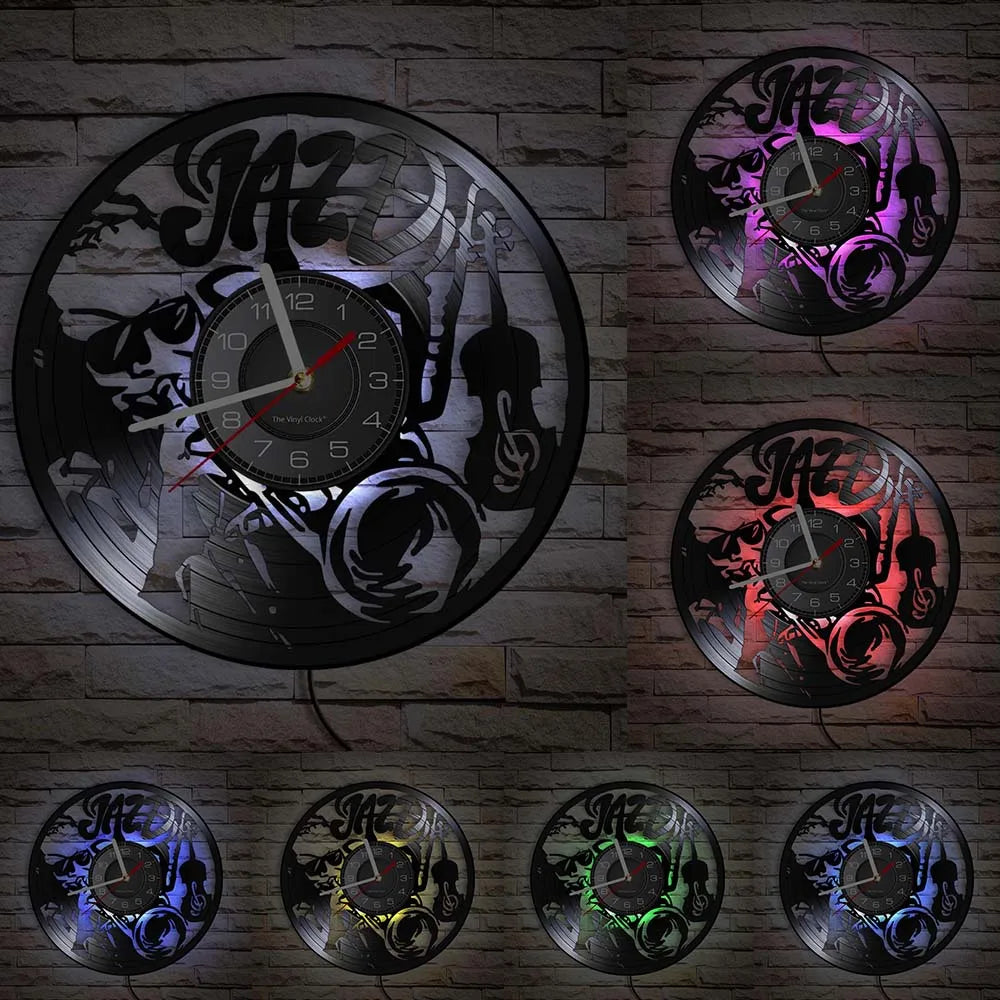 A collection of vintage vinyl record wall clocks in various colors and styles mounted on a brick wall.