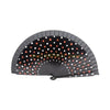 Elegant wooden hand fan with black and orange polka dots, shown in a semi-open fan shape.