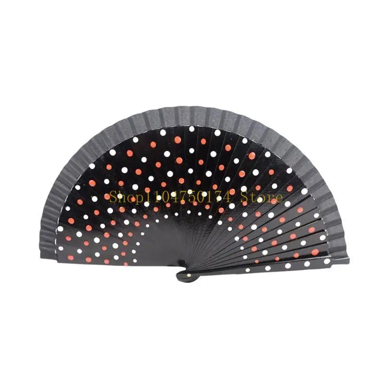 Elegant wooden hand fan with black and orange polka dots, shown in a semi-open fan shape.