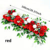 A long floral arrangement of red roses and white flowers on green leaves, measuring 100cm.