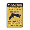 A vintage metal tin sign with a yellow background and red text warning if you are found here tonight you will be found here t