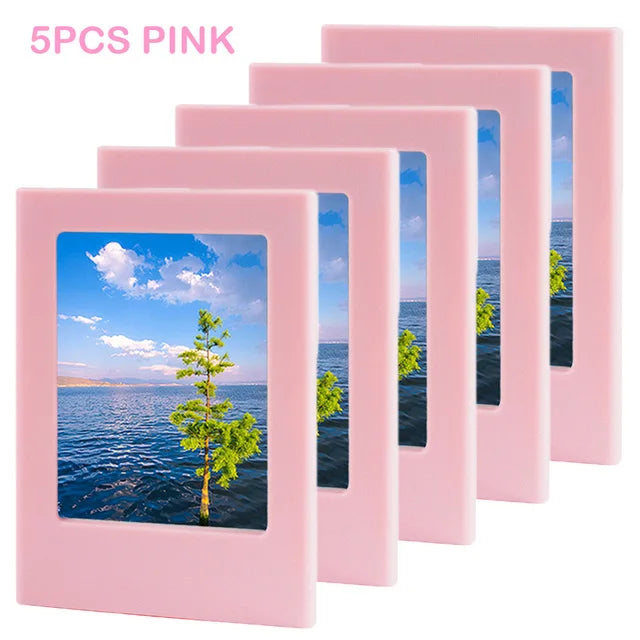 Five pink magnetic photo frames displaying a scenic landscape with trees and water.