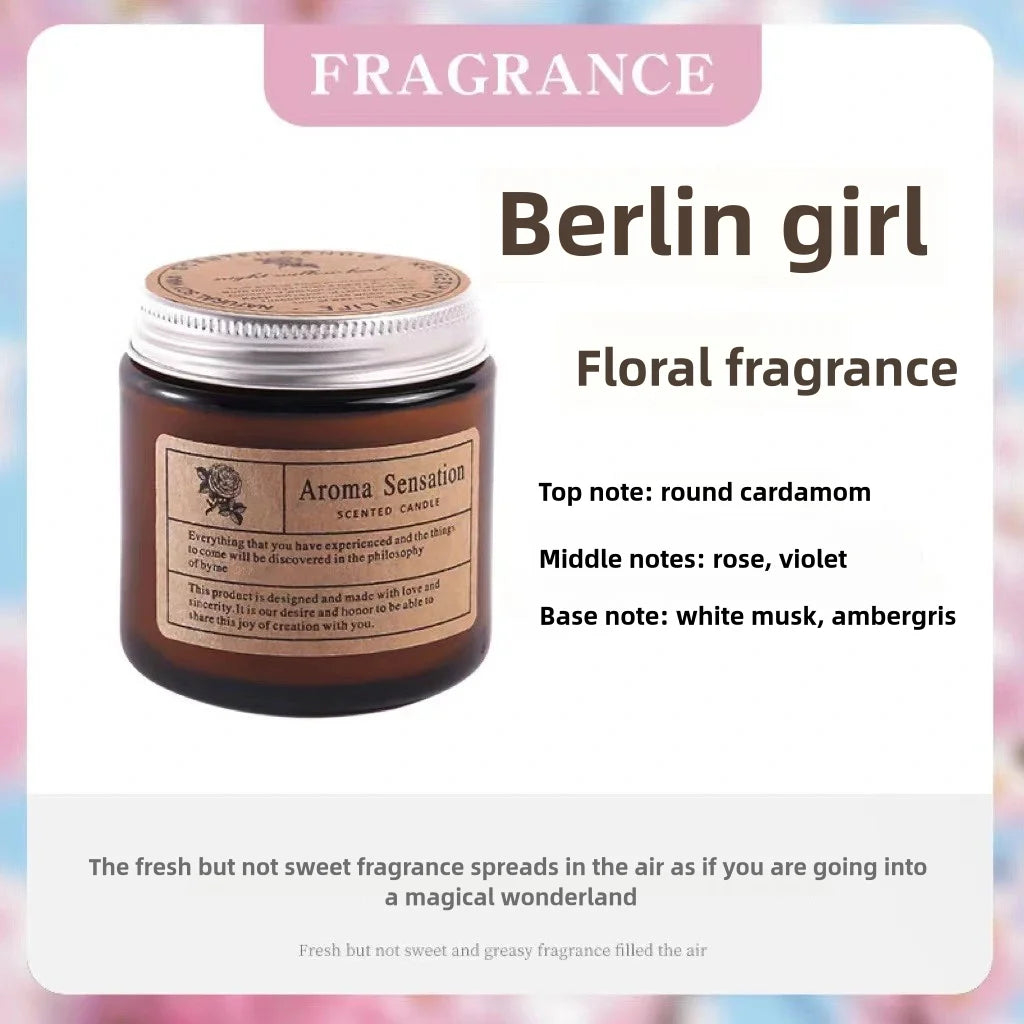 A jar of Berlin girl floral fragrance candle with a gold lid and label