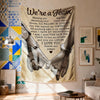A fabric wall tapestry featuring a hand-holding design with text that reads We're a Team and I love you