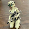 A female rifleman desktop figurine with blonde hair, goggles, and a tactical rifle.