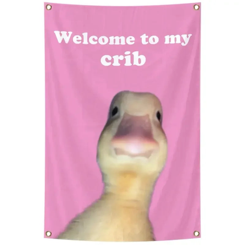 A pink tapestry featuring a cartoon duck looking out from its crib.