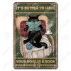 Décor mural vintage en métal représentant un chat noir assis dans un fauteuil à lire un livre