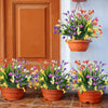 A collection of vibrant artificial calla lily bouquets in various colors displayed on a white wall.