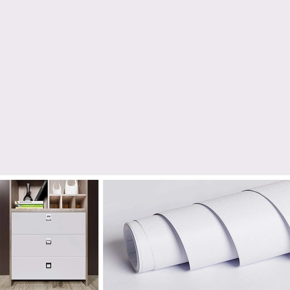 A stack of white peel and stick decor stickers on a white surface.