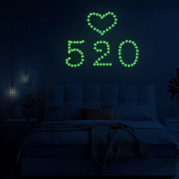 A glowing green heart and the numbers 520 are displayed on a dark wall above a bed.