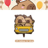 A cute cardboard decoration featuring two bear heads and a yellow car, suitable for a birthday party.