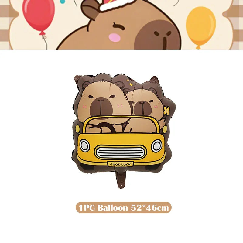 A cute cardboard decoration featuring two bear heads and a yellow car, suitable for a birthday party.
