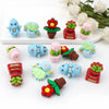 A collection of colorful 3D silicone plant beads in various shapes and colors for jewelry making and DIY crafts.