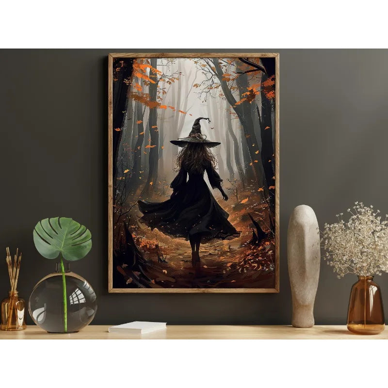 Canvas wall art depicting a dark witch in a wide-brimmed hat walking through an autumn forest.