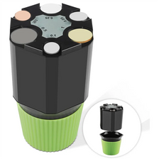 A black coin organizer with multiple compartments and a green base, showing the top view and bottom view.