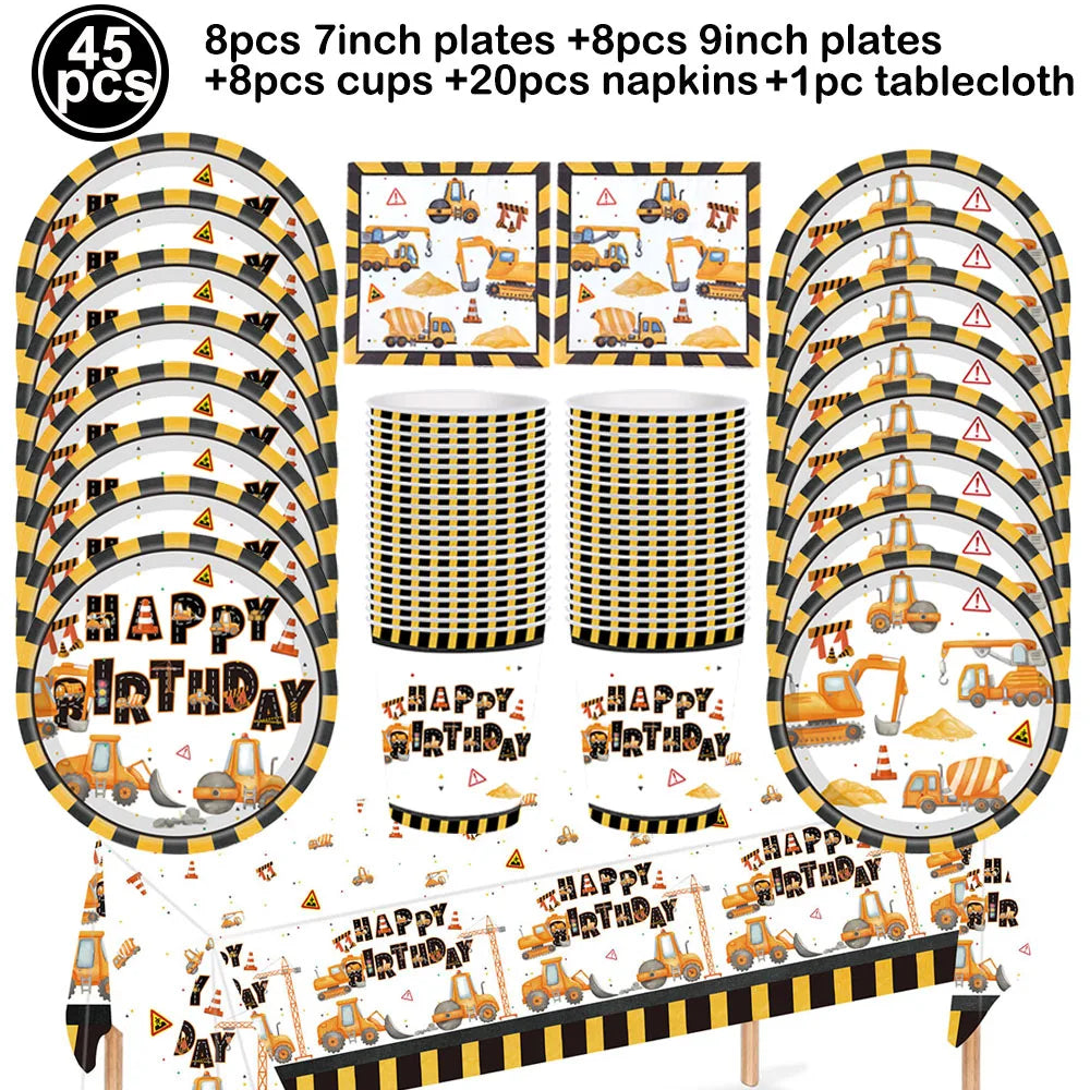 A set of construction vehicle themed birthday party tableware including plates, cups, napkins, and a tablecloth.