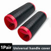 A pair of black and red universal silicone handlebar grip covers rolled up.