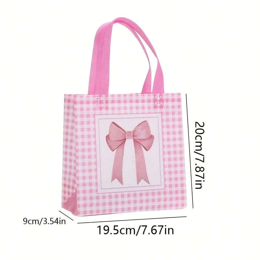 Pink and white checkered gift bags with pink bows and heart cutouts