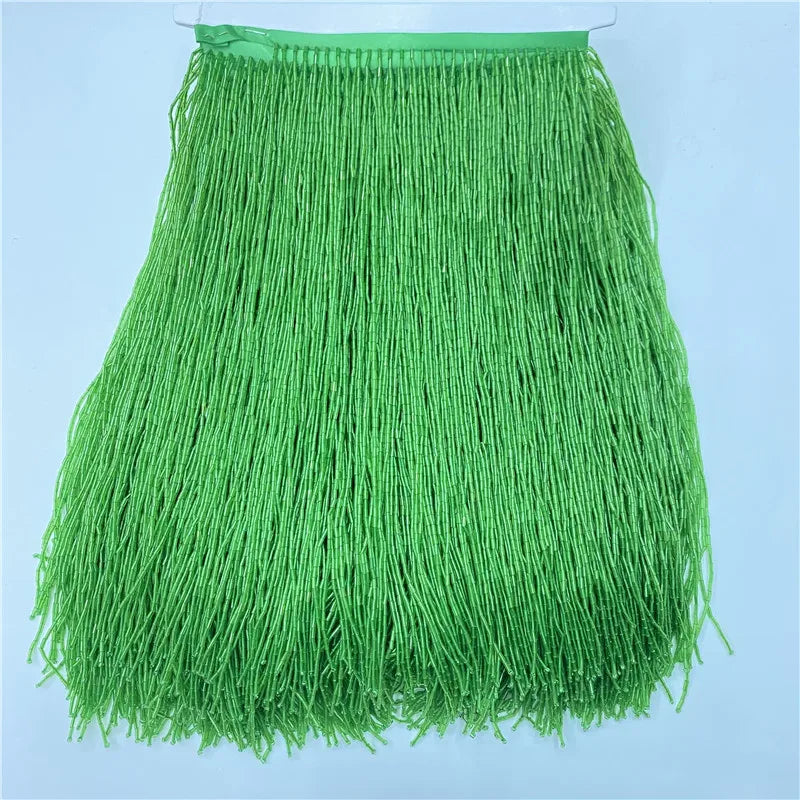 Bright green beaded tassel fringe trim for curtains and DIY projects