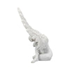 White resin angel wing figurine with delicate feathers.
