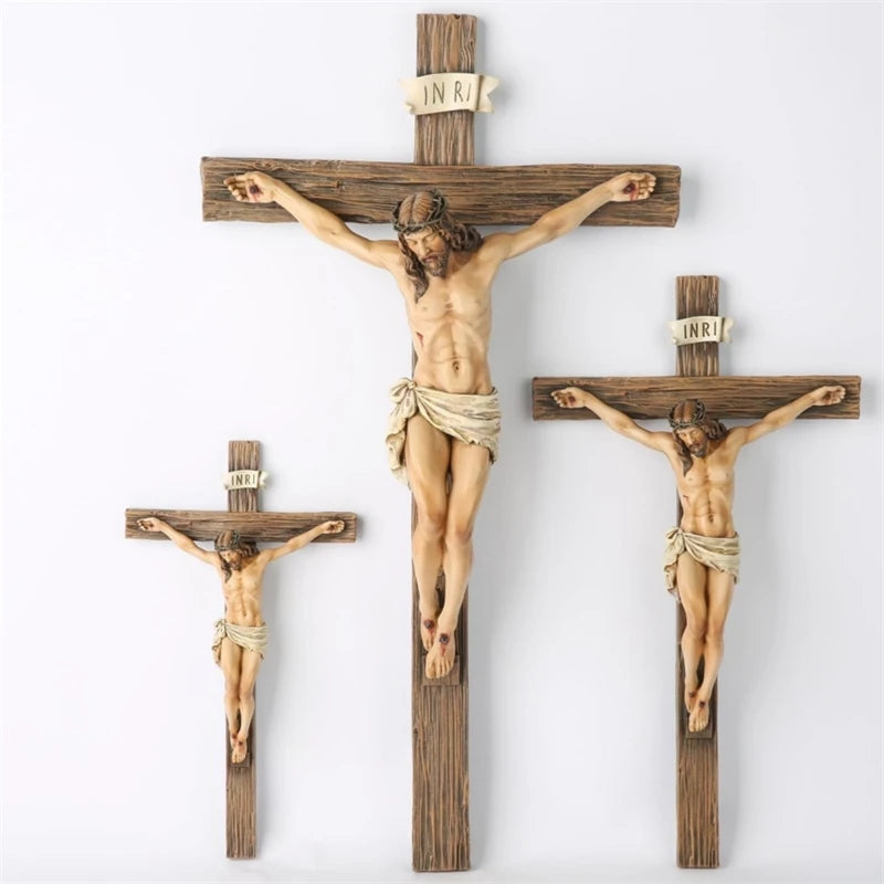 A wooden cross with a resin figure of Jesus Christ crucified, used for home and office decor.