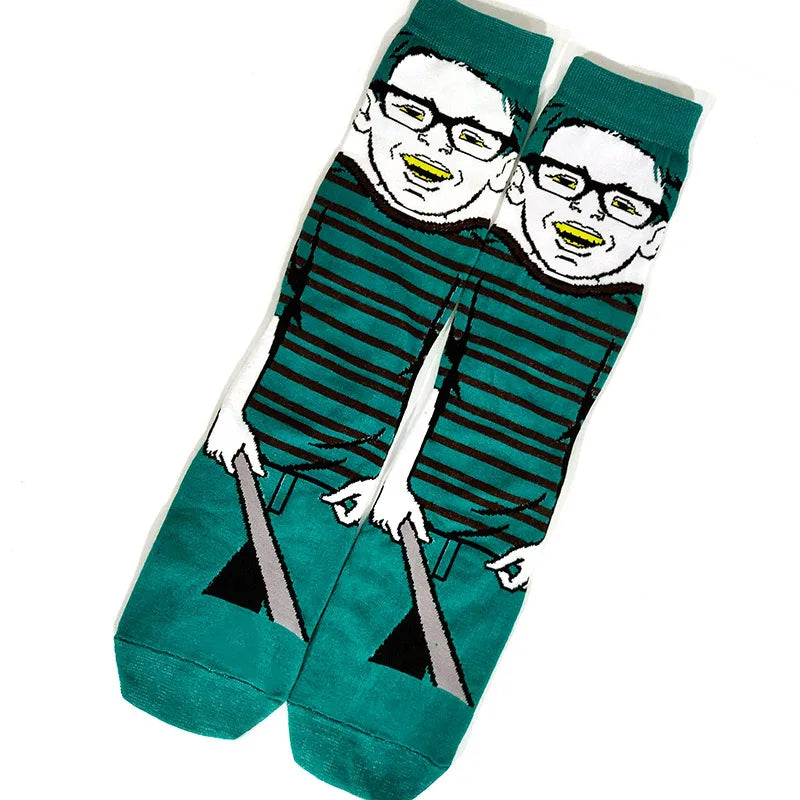 A pair of novelty crew socks featuring a graphic print of a man with glasses and a yellow tongue.