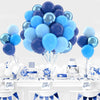 A balloon party decor kit featuring blue and silver balloons, confetti accents, and birthday decorations on a white table.
