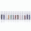 A row of ten glass roll-on bottles filled with various semi-precious stone roller balls in different colors and textures.
