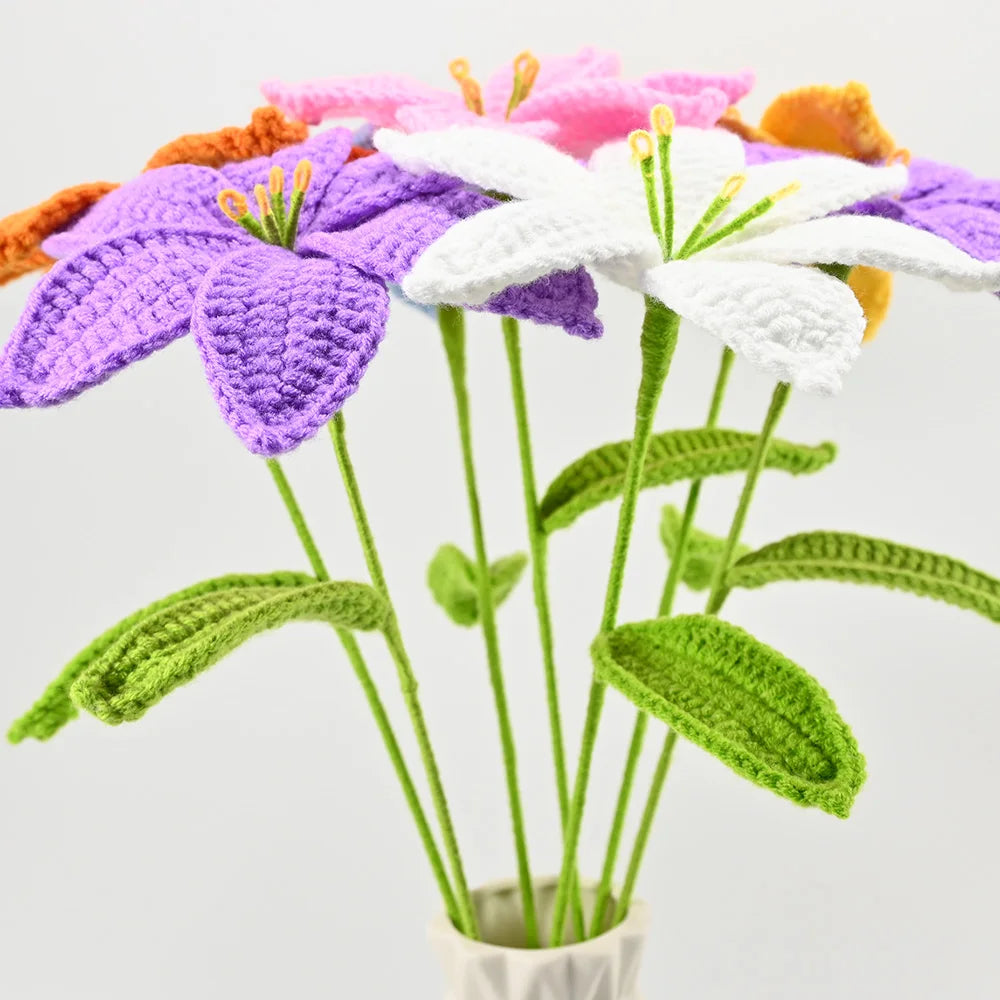 Hand-crocheted artificial lily bouquet featuring purple and white flowers on green stems