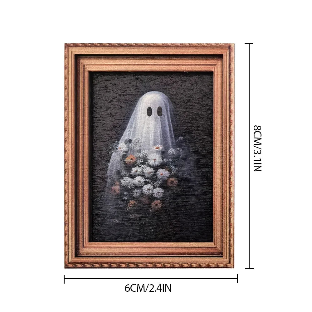 A framed picture featuring a white ghost surrounded by small flowers and foliage.