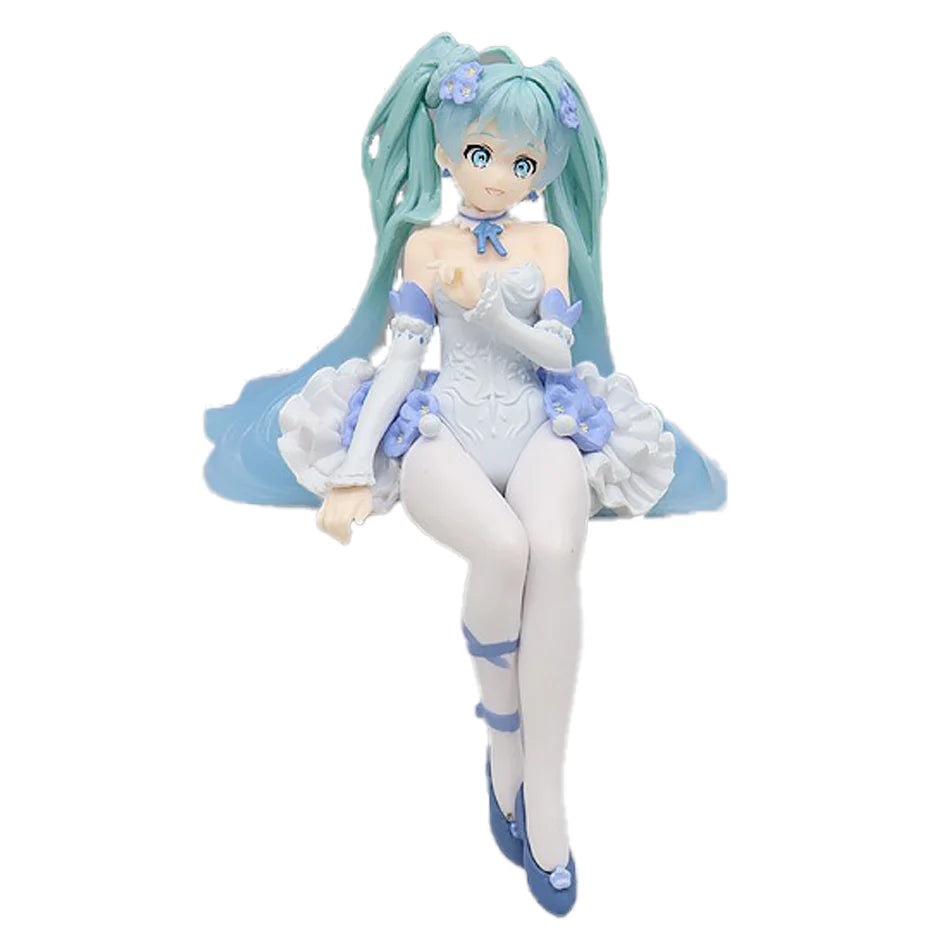A PVC collectible figurine of Hatsune Miku with teal hair and blue outfit, featuring purple flowers.
