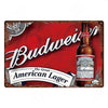 A vintage metal sign featuring the Budweiser logo and text for bar or pub decor.